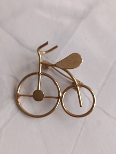 Gold tone penny farthing - tone,